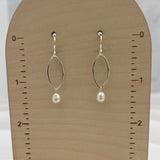 Handmade pearl drop earrings with double marquis frames displayed on wooden earring card showing 1.5 inch length