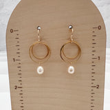 Handcrafted gold vermeil and pearl earrings on display card showing 1.5 inches in length