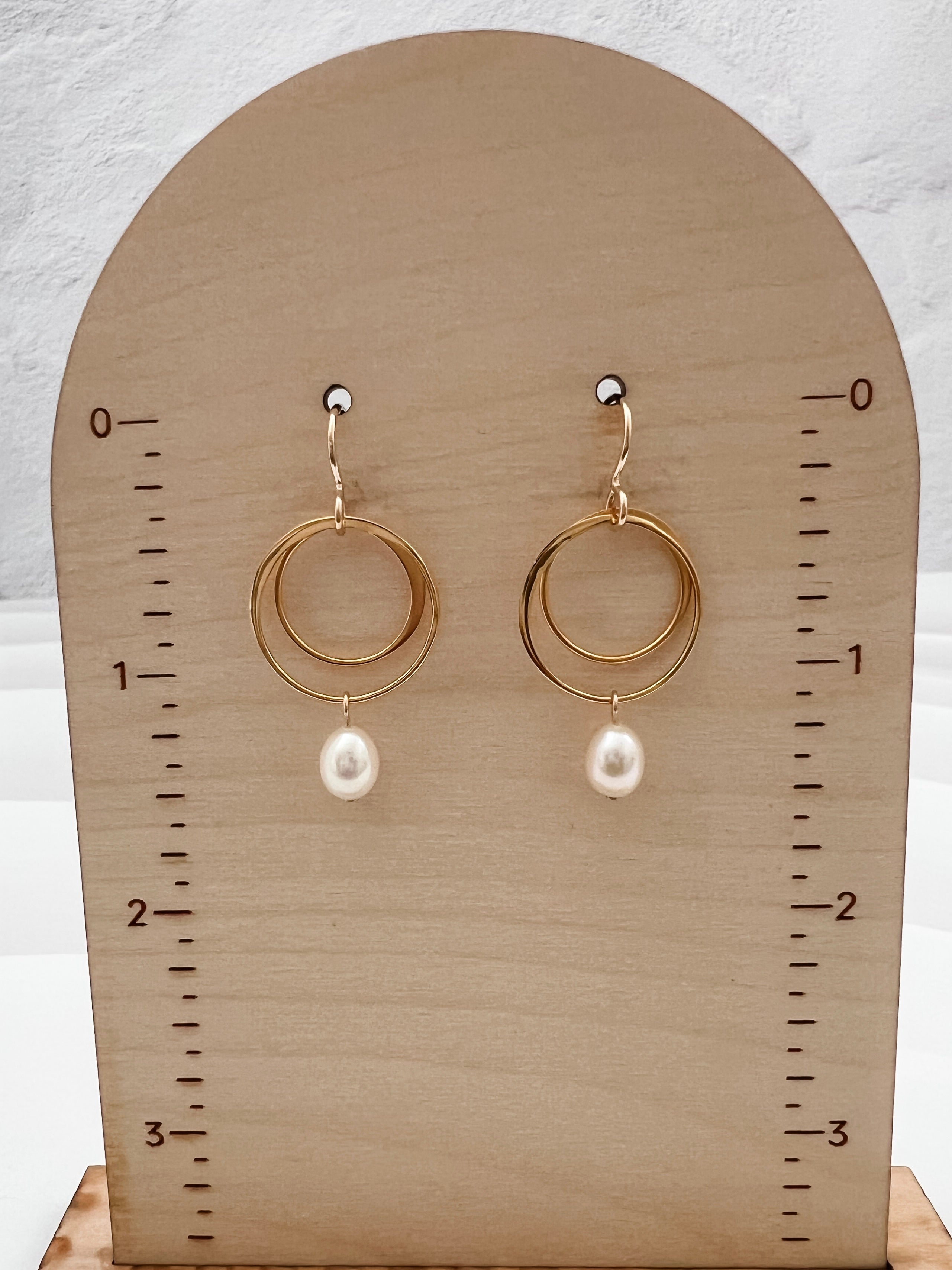 Handcrafted gold vermeil and pearl earrings on display card showing 1.5 inches in length