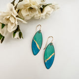  Seafoam green and blue enamel marquise drop earrings with 24k gold foil diagonal accent and 14k gold fill ear wires, styled with white fabric flowers