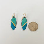Seafoam green and blue enamel marquise earrings with 24k gold foil accent shown next to a quarter for scale, approximately 1.75 inches in length